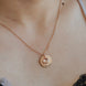 Amira Necklace — a personalized piece featuring a birthstone pendant and custom engraving
