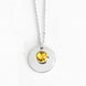 Amira Necklace — a personalized piece featuring a birthstone pendant and custom engraving